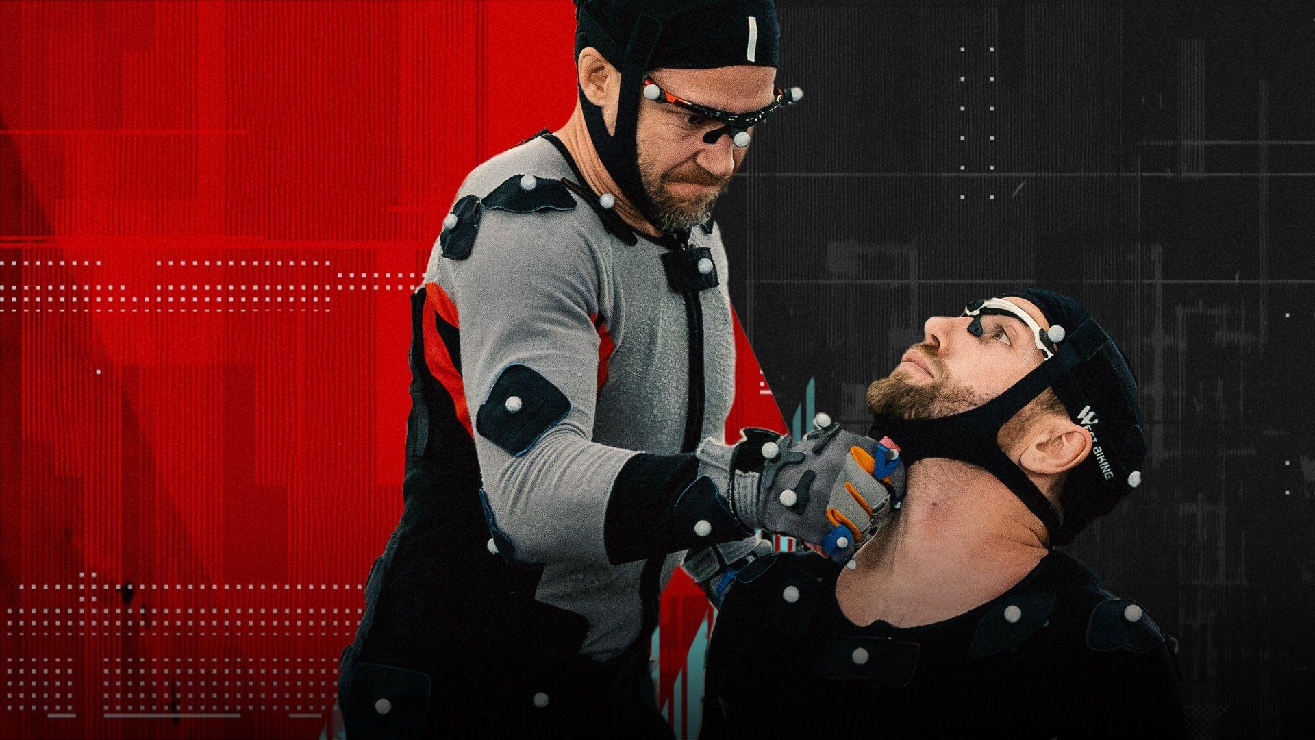 red and black background with two people in mocap suits